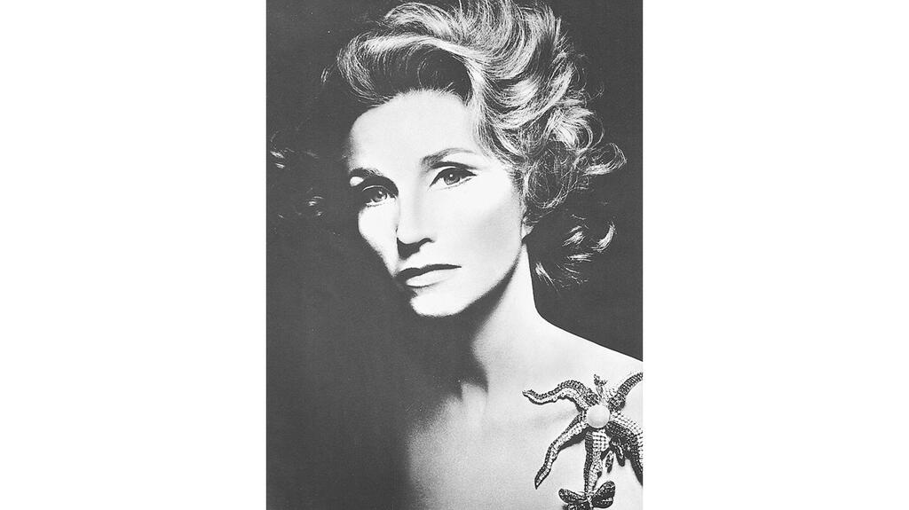 Harkness was seen wearing the starfish in myriad ways, like provocatively clinging to her breast or draped over her shoulder, as seen in this photo. Rebekah Harkness starfish brooch